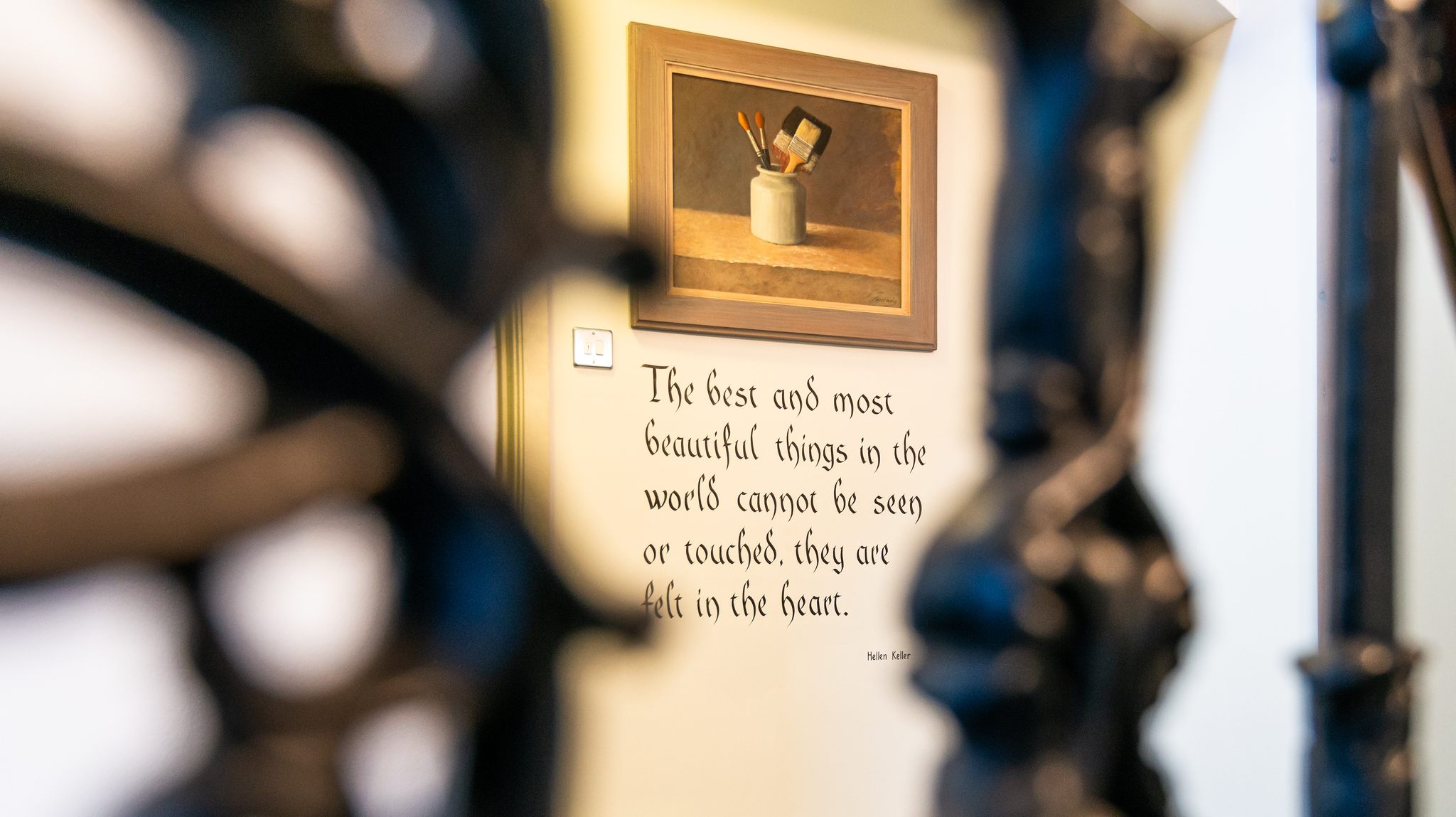 Calligraphy on the wall of Wellsprings House in Malvern. Photo by Digitlight Photography